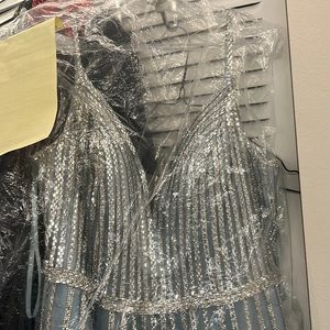 Light blue and silver formal gown, size16… dress on (never have I ever)